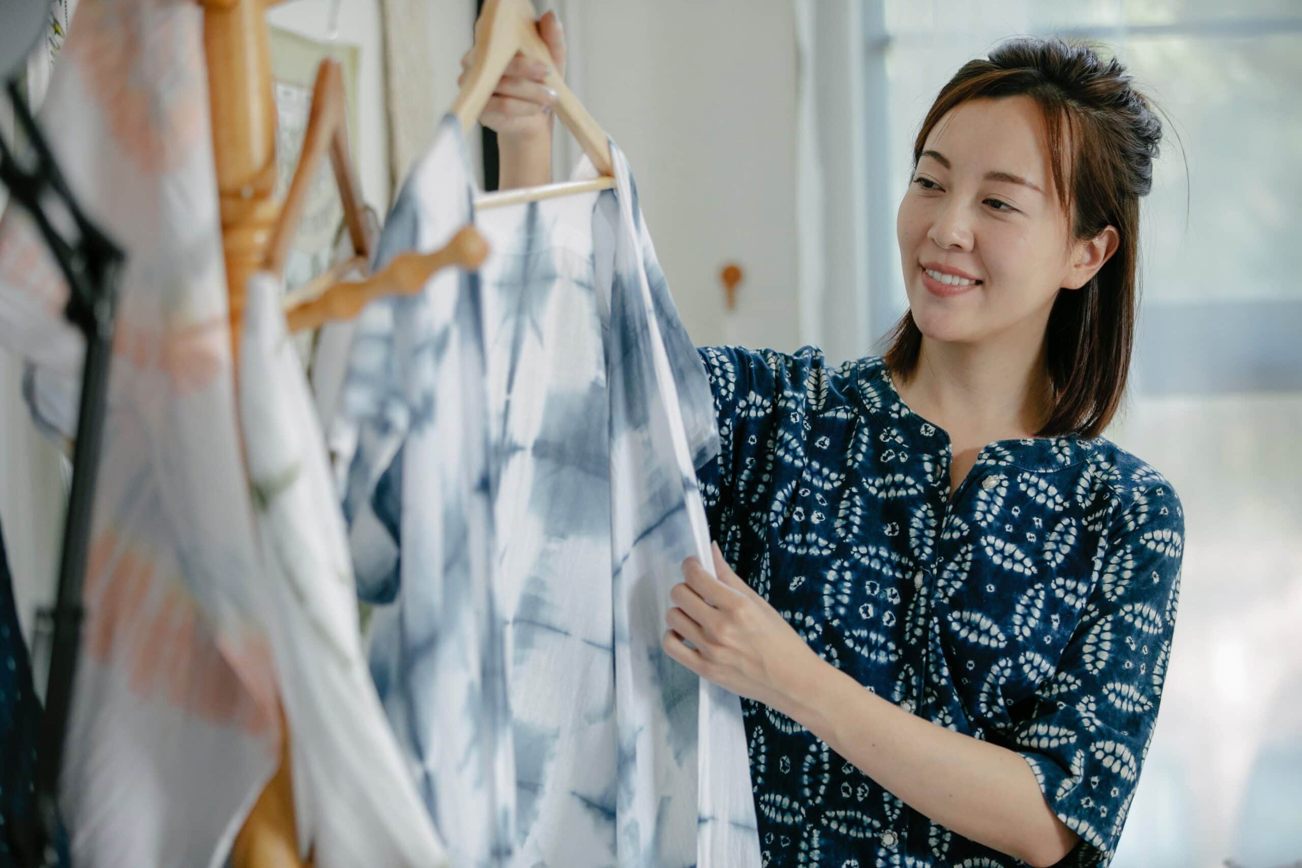 Fashion Designer showing tie-dyed top